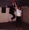 2 Pictures - Soke Verkerke Jumping Front Snap Kick 8ft.